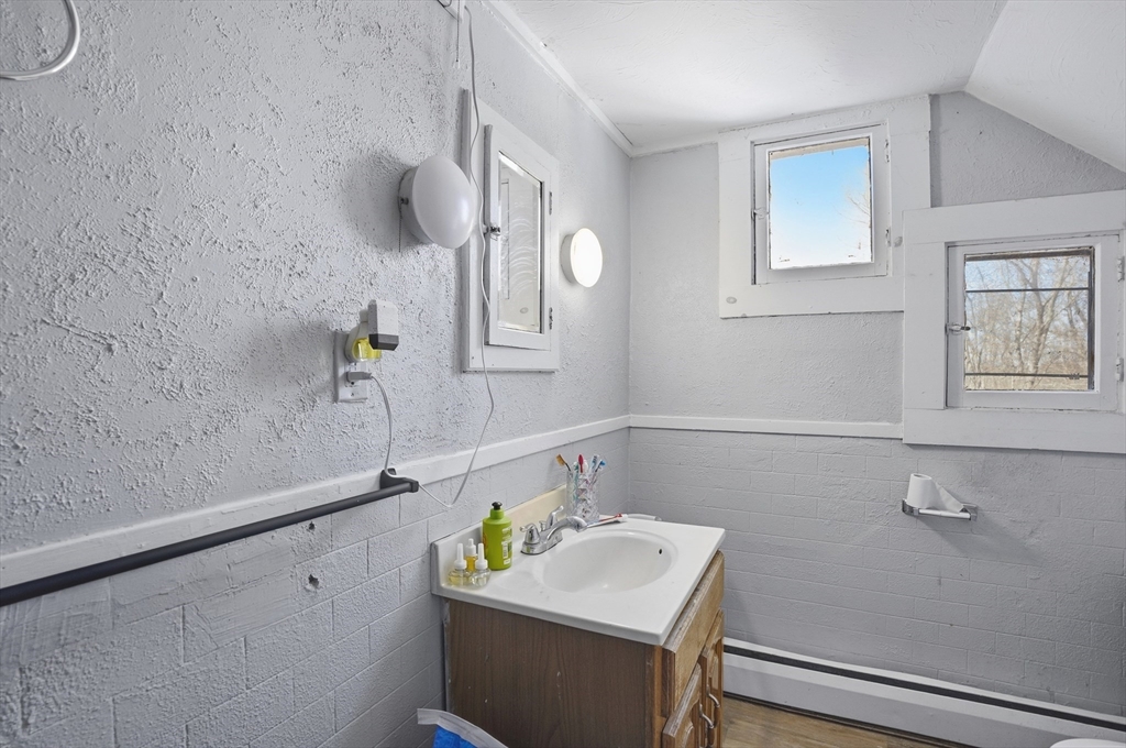 52-56 Green Street Athol, MA 01331 - Photo 22 of 41 a bathroom with a sink and a bathtub