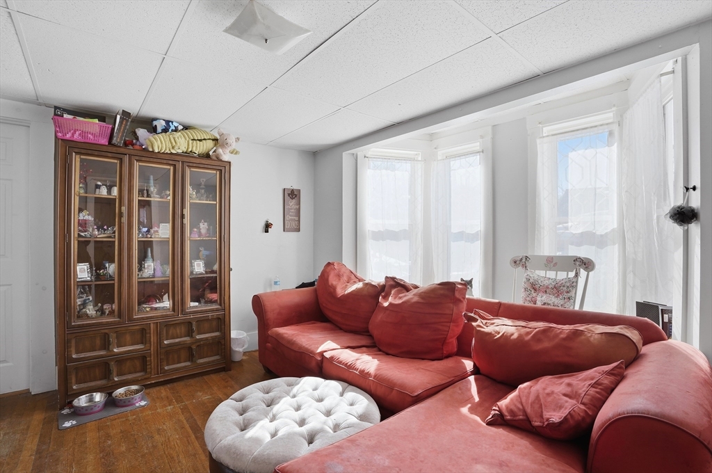 52-56 Green Street Athol, MA 01331 - Photo 26 of 41 a living room with furniture and a large window