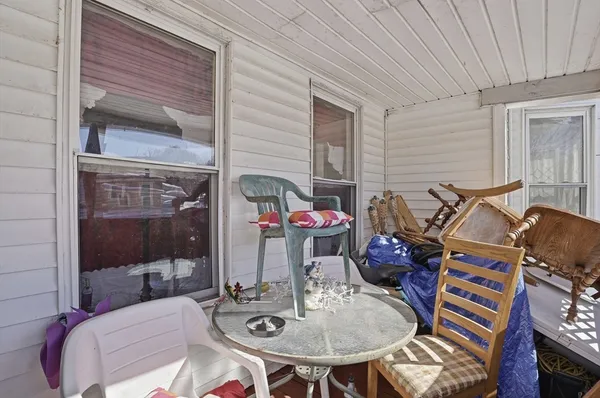 a backyard of a house with seating space