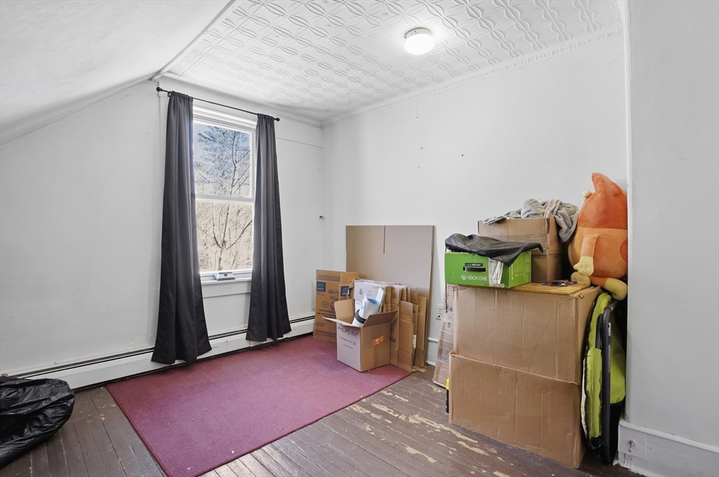 52-56 Green Street Athol, MA 01331 - Photo 32 of 41 a living room with furniture and a window