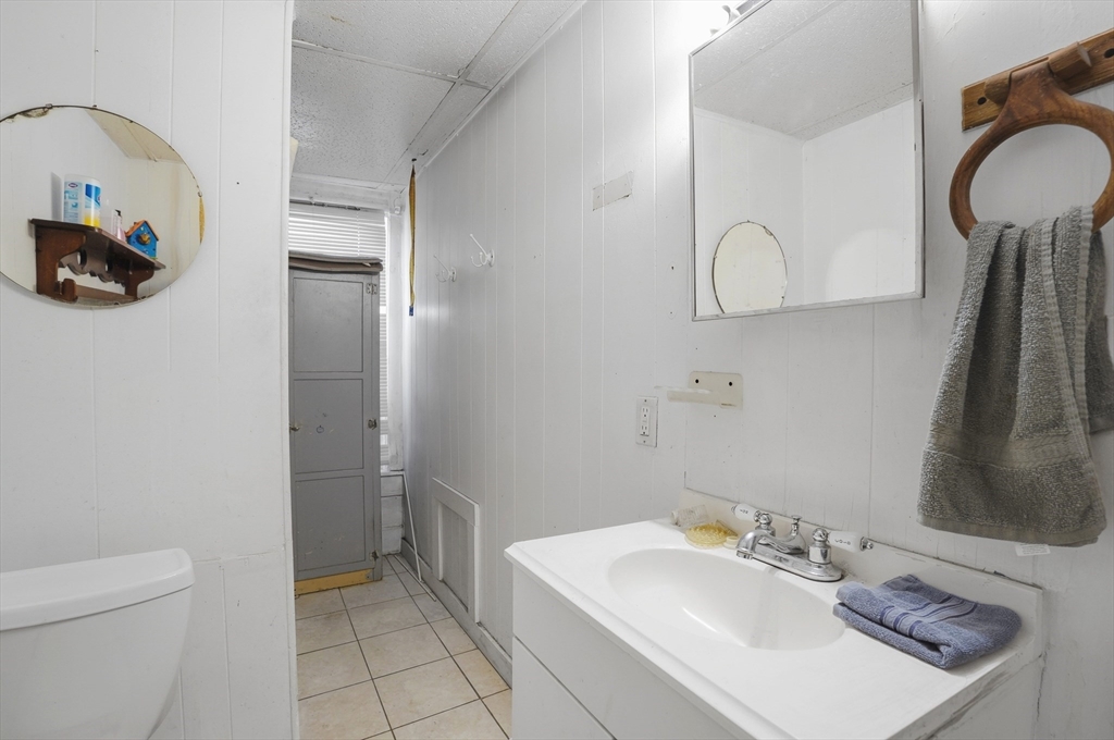 52-56 Green Street Athol, MA 01331 - Photo 35 of 41 a bathroom with a sink a toilet and shower