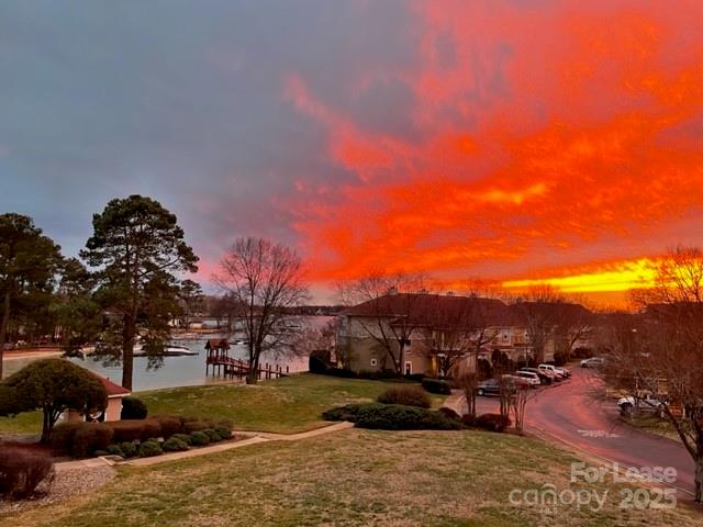 a view of a town with big trees