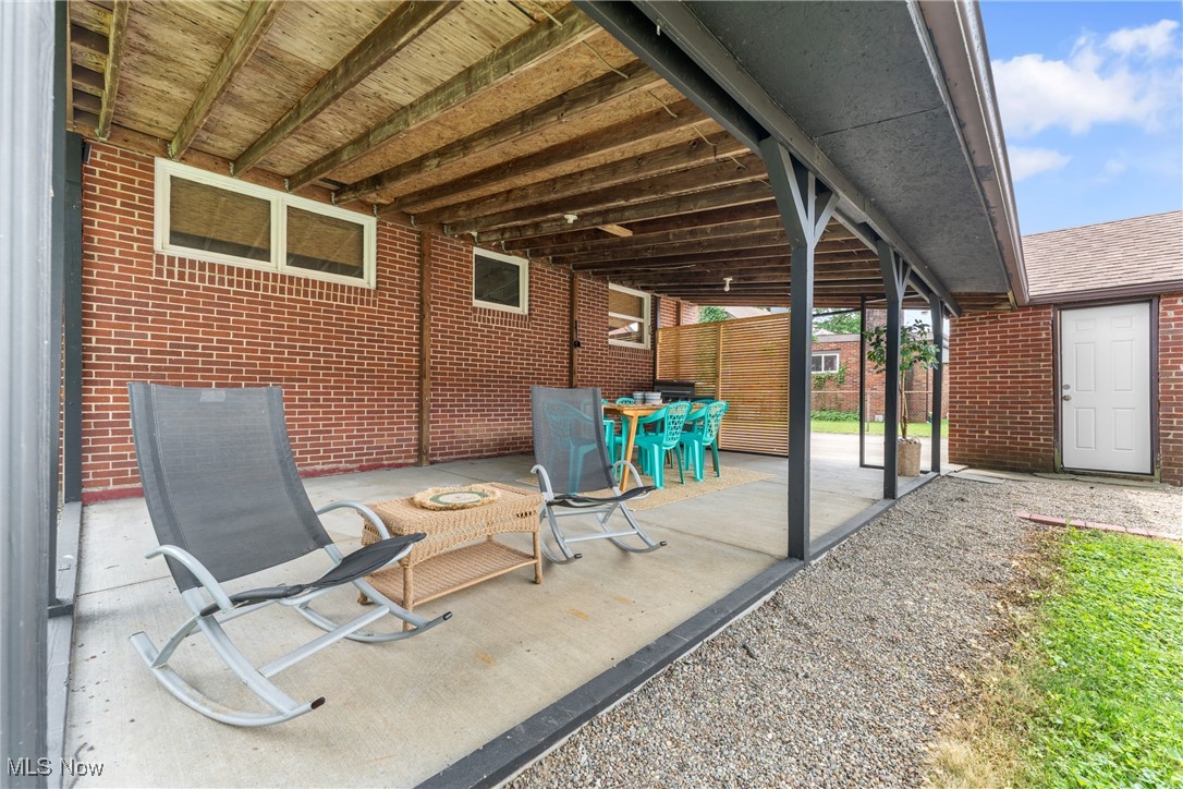 1515 Deville Avenue Northwest Canton, OH 44708 - Photo 41 of 42 View of patio featuring outdoor dining space