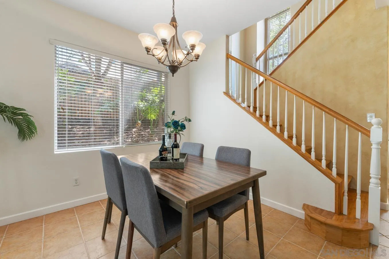 614 Compass Court Carlsbad, CA 92011 - Photo 12 of 33 a view of a dining room with furniture window and wooden floor