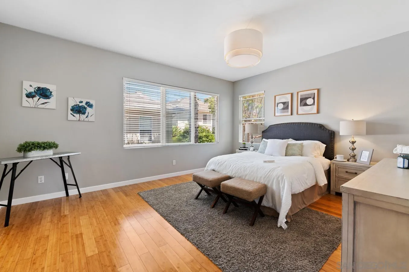 614 Compass Court Carlsbad, CA 92011 - Photo 20 of 33 a bedroom with a bed and a table