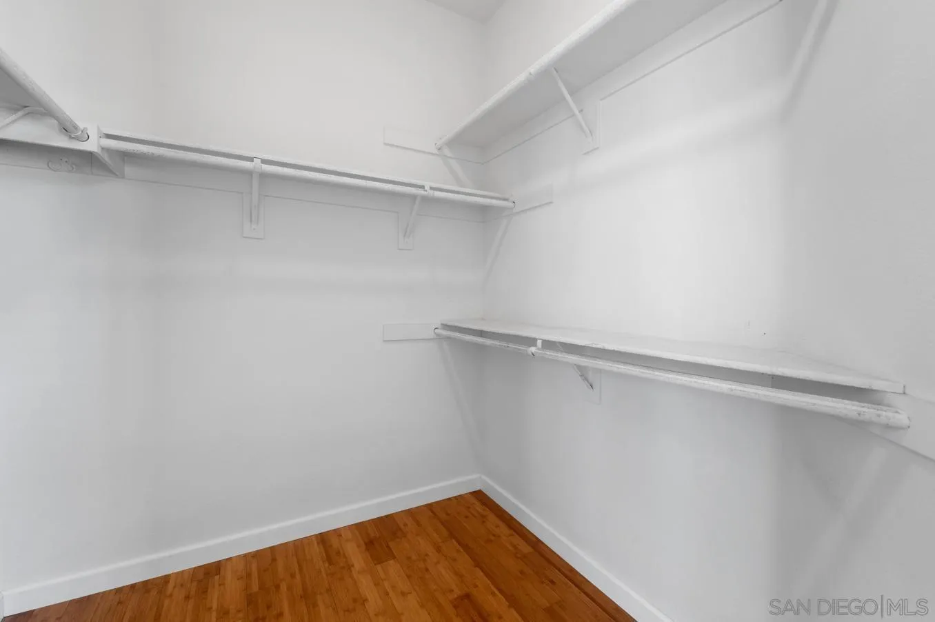 614 Compass Court Carlsbad, CA 92011 - Photo 21 of 33 a view of a room with shelf on the wall