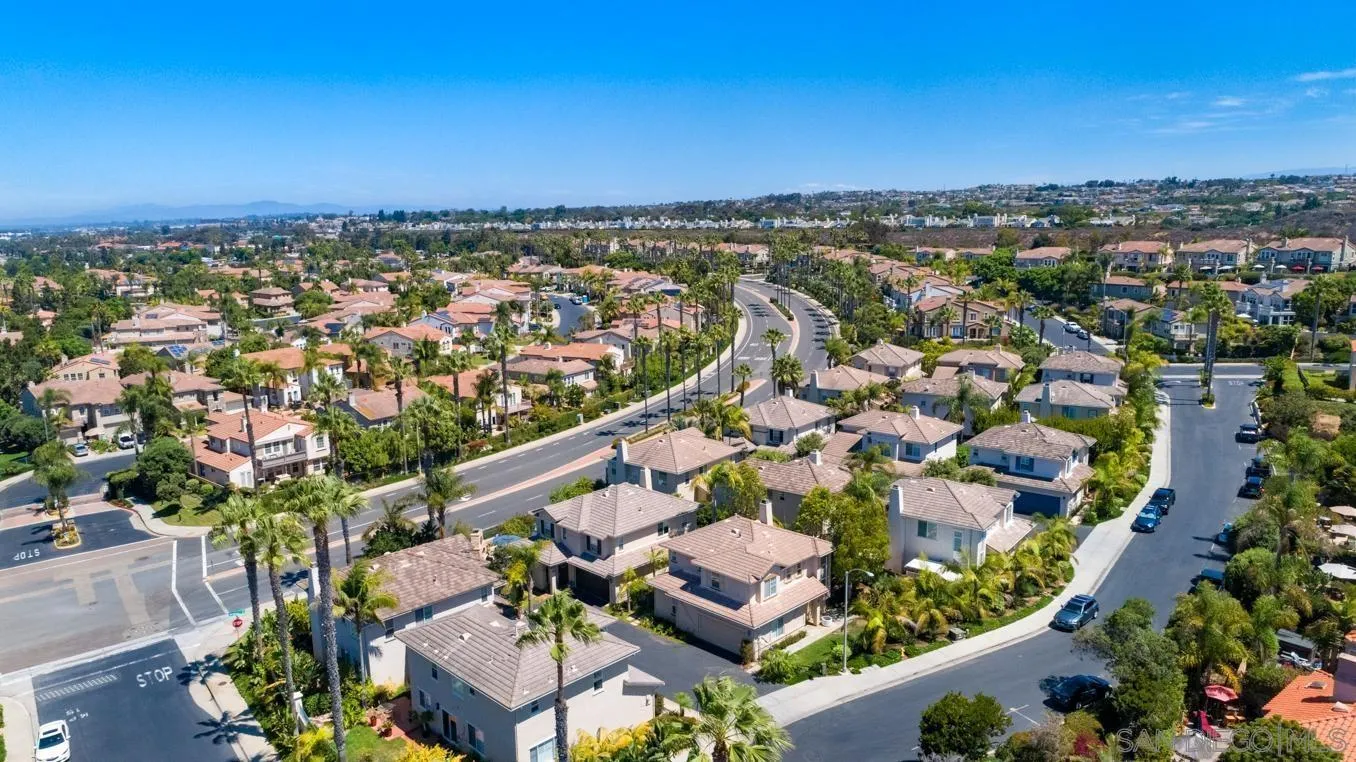 614 Compass Court Carlsbad, CA 92011 - Photo 29 of 33 an aerial view of residential houses with outdoor space and trees