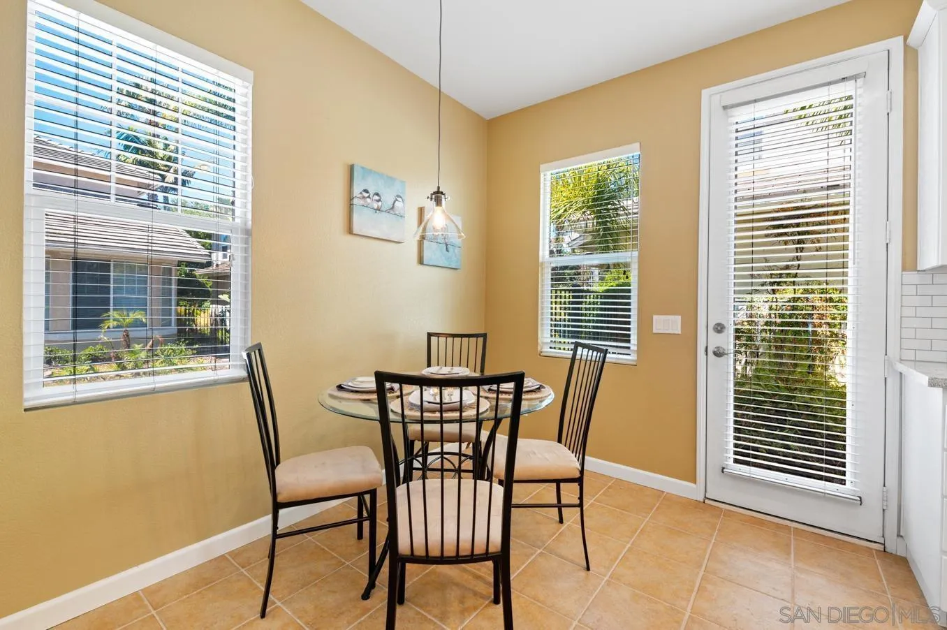 614 Compass Court Carlsbad, CA 92011 - Photo 9 of 33 a view of a dining room with furniture and windows