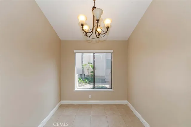 a view of a refrigerator and window