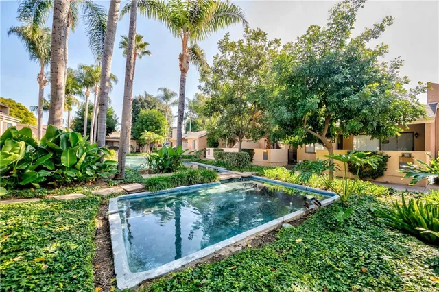 a view of a swimming pool with a patio