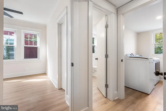 a view of entryway with wooden floor