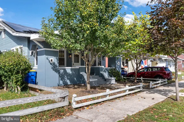front view of house with a yard