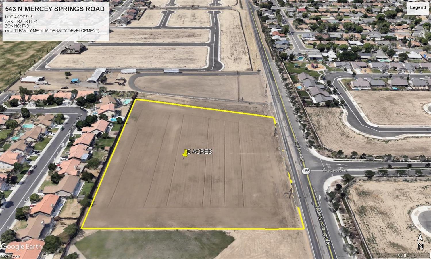 543 North Mercey Springs Road Los Banos, CA 93635 - Photo 3 of 3 a view of a balcony with floor to ceiling windows