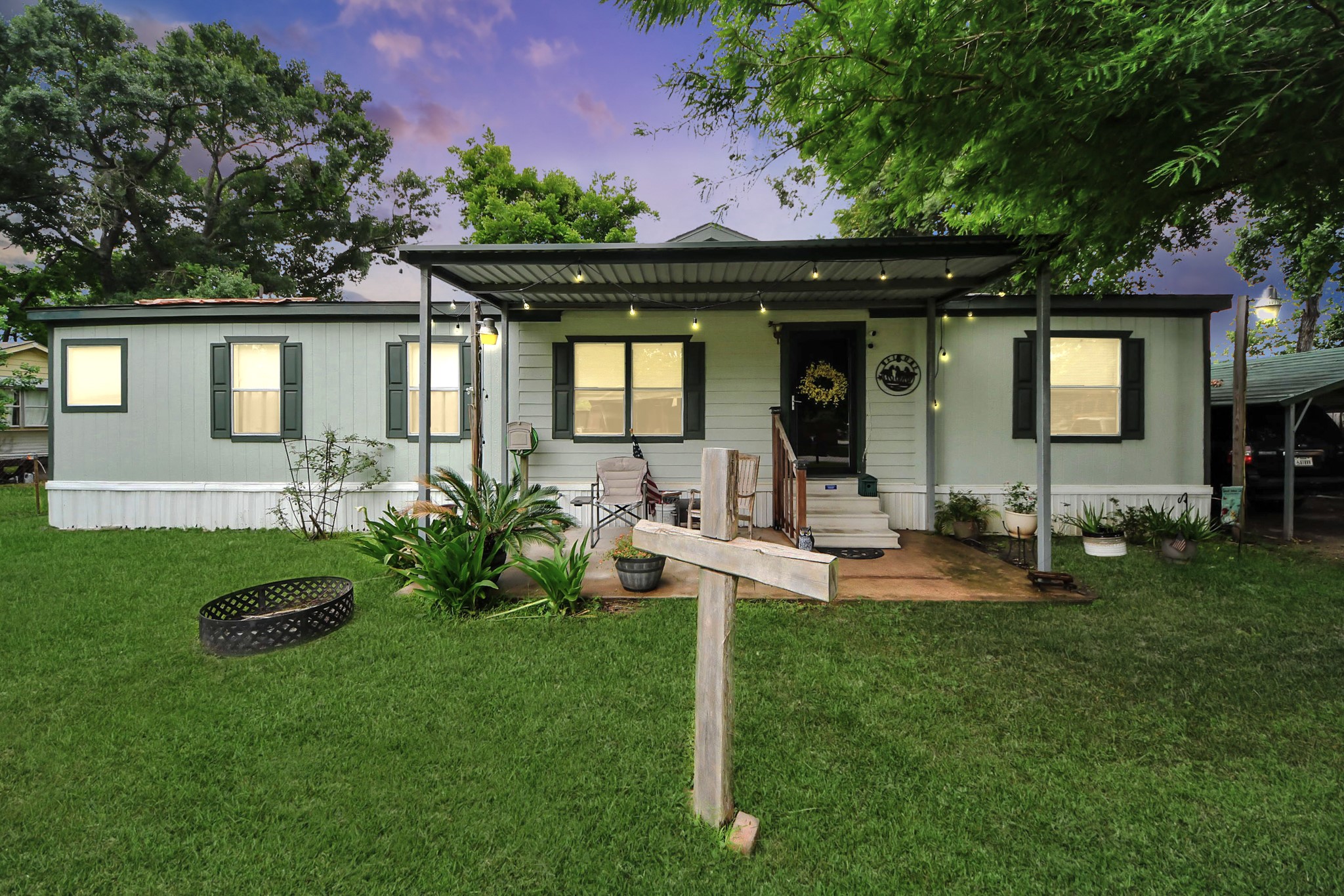 204 Edith Street Highlands, TX 77562 - Photo 1 of 33 a front view of a house with garden