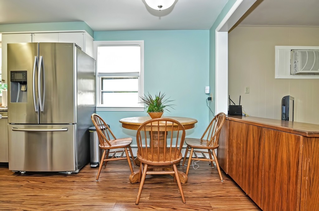 15 Rydal Street Worcester, MA 01602 - Photo 8 of 29 a dining room with furniture and wooden floor