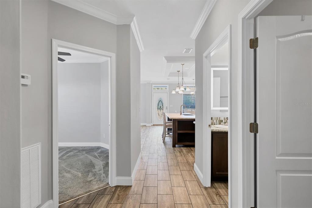3607 70th Avenue East Ellenton, FL 34222 - Photo 18 of 43 a bathroom with a sink and a mirror