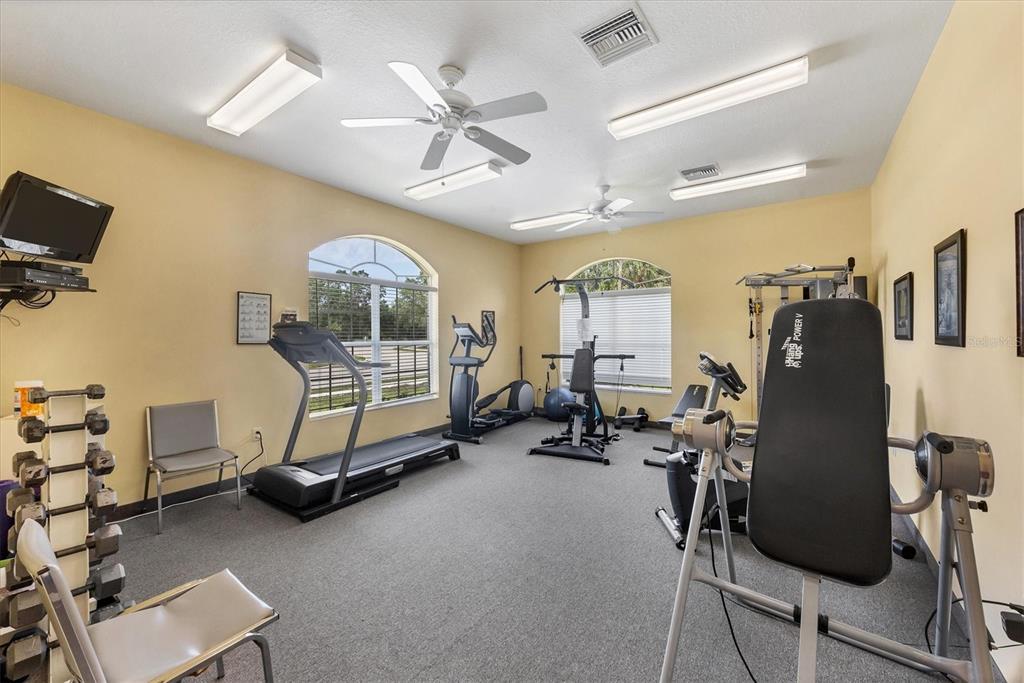 3607 70th Avenue East Ellenton, FL 34222 - Photo 38 of 43 a bedroom with furniture and a window