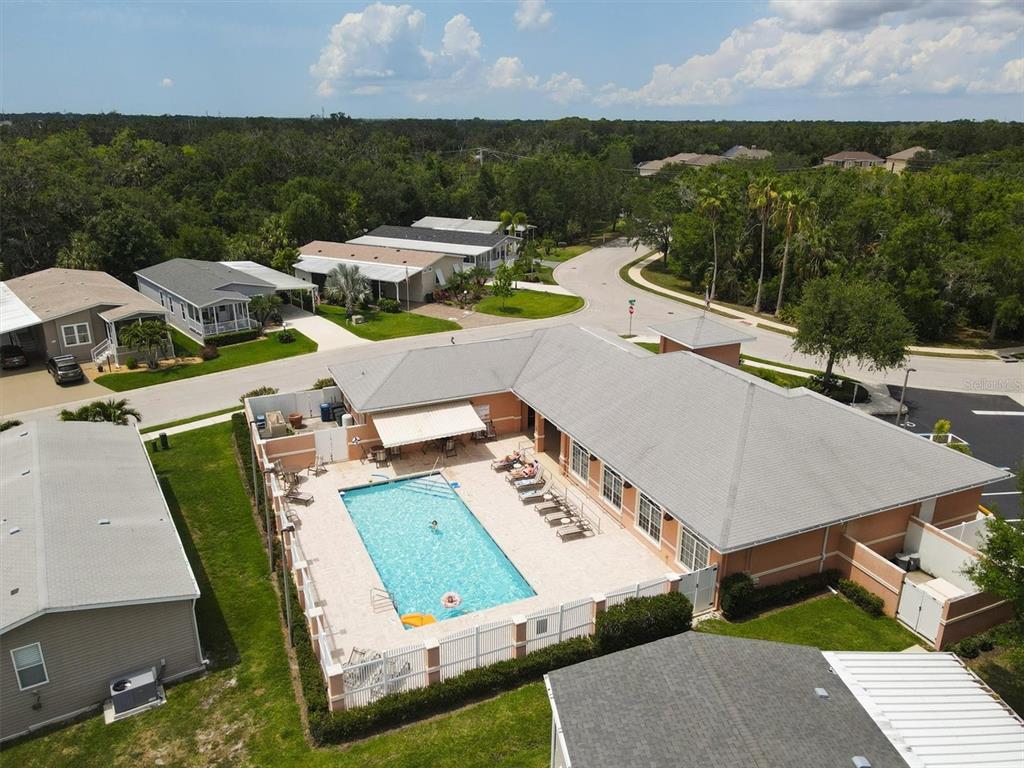 3607 70th Avenue East Ellenton, FL 34222 - Photo 43 of 43 an aerial view of a house with swimming pool and mountains