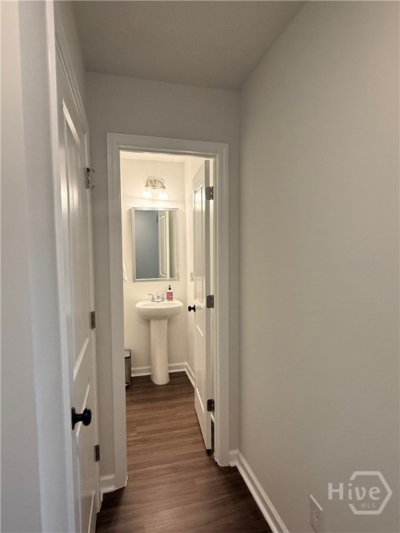 1244 Wilkins Road Midway, GA 31320 - Photo 16 of 58 Hallway Leading to Half Bath located on floor 1