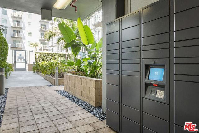 a view of a building with a swimming pool