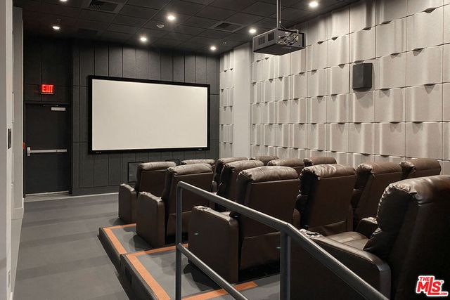 a bathroom with a shower and a toilet