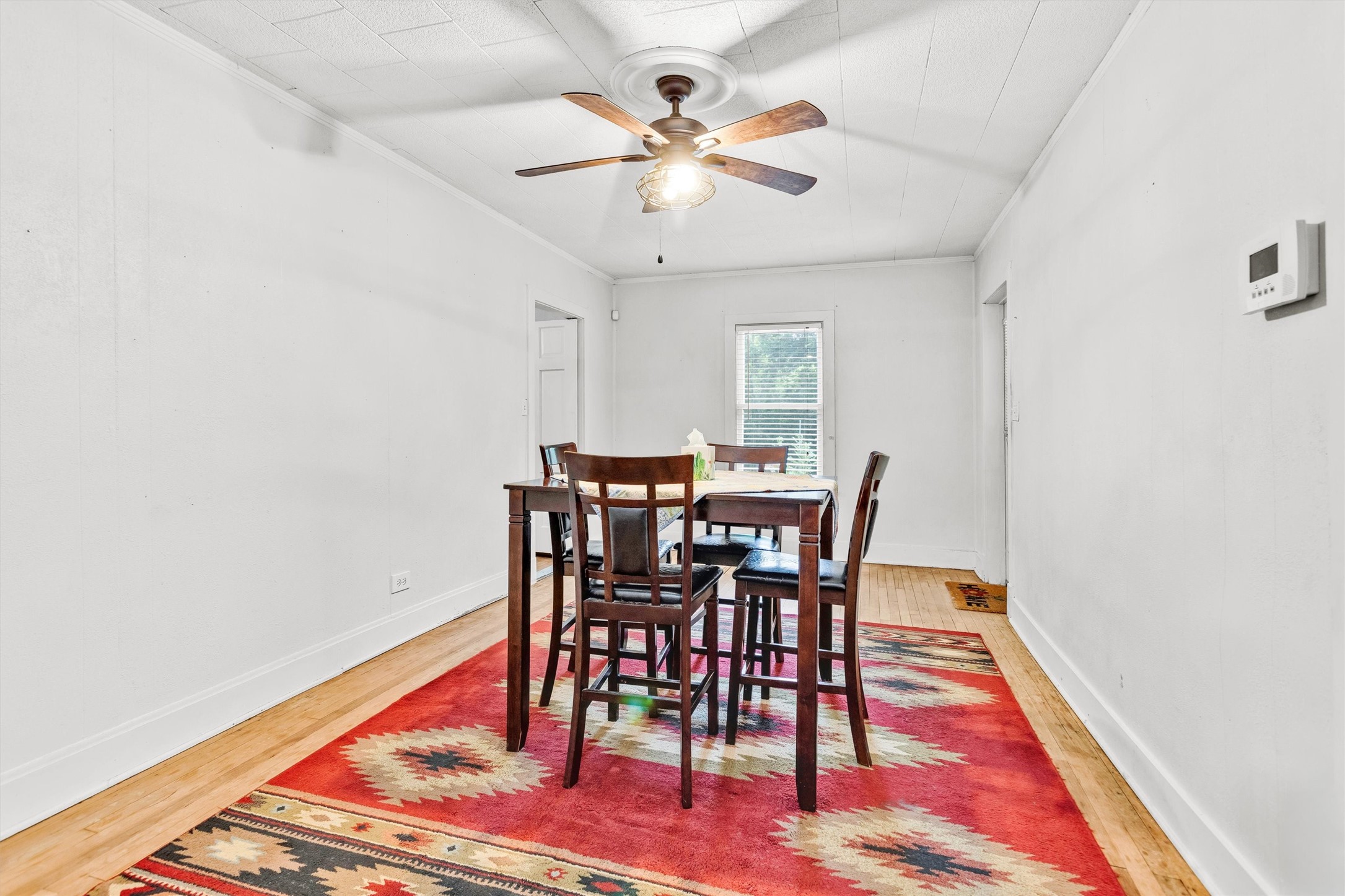 1720 18th Street Huntsville, TX 77340 - Photo 11 of 37 a view of a dining room with furniture