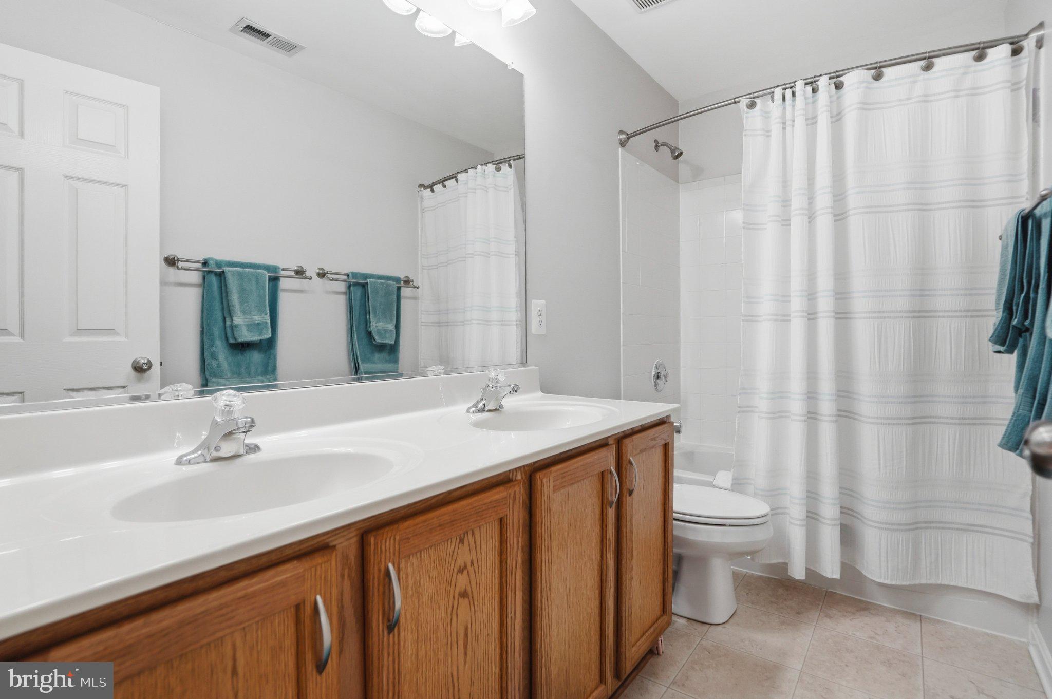 803 Rustic Court Perryville, MD 21903 - Photo 30 of 37 Modern bathroom with dual sinks.