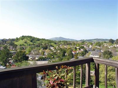 844 Arlene Way Novato, CA 94947 - Photo 1 of 7 a view of city and mountain from a balcony