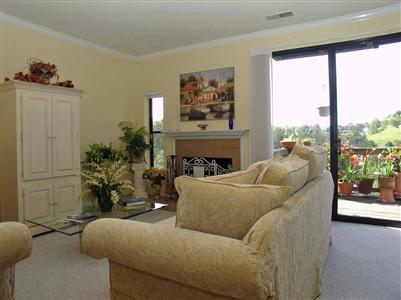 844 Arlene Way Novato, CA 94947 - Photo 4 of 7 a living room with furniture large window and a fireplace
