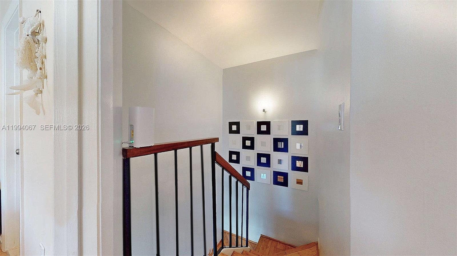 6840 Southwest 45th Lane, Unit 5 Miami, FL 33155 - Photo 23 of 34 a view of a hallway with toys