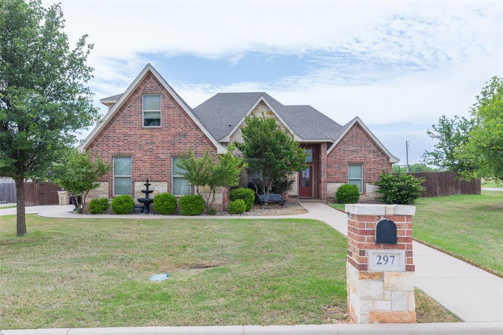 297 Magnum Street Tuscola, TX 79562 - Photo 1 of 35 a front view of house with yard and green space