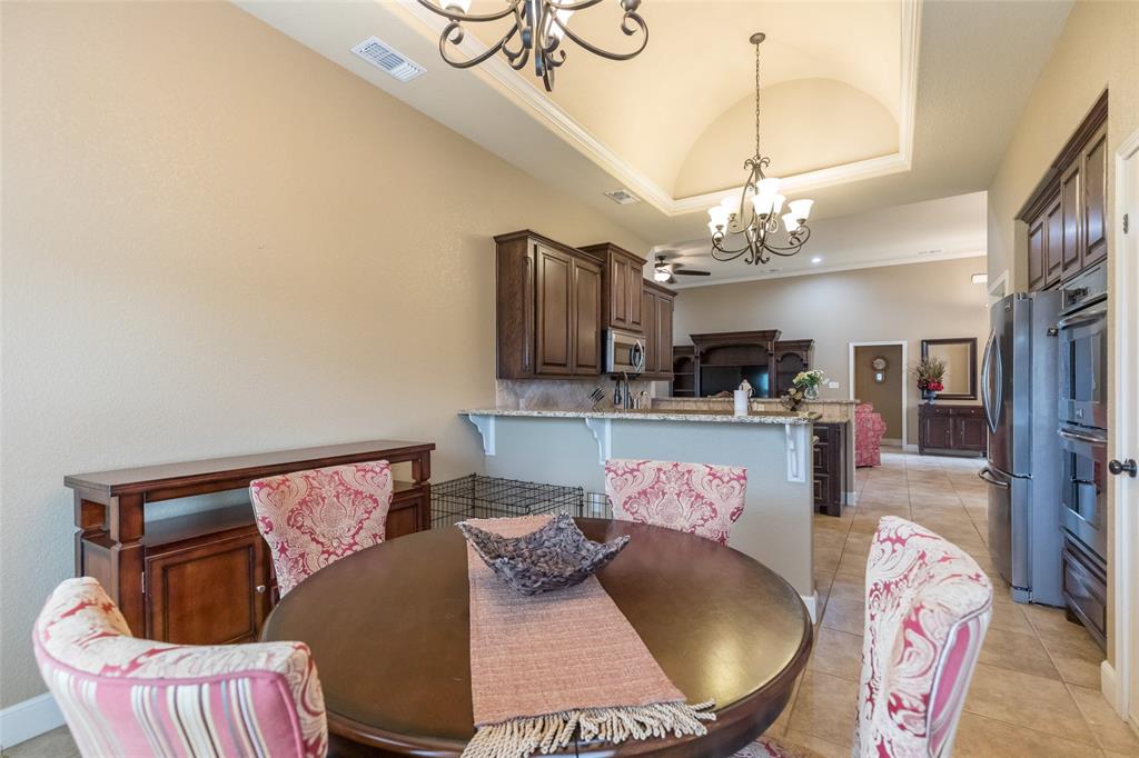 297 Magnum Street Tuscola, TX 79562 - Photo 14 of 35 a living room with furniture and kitchen view