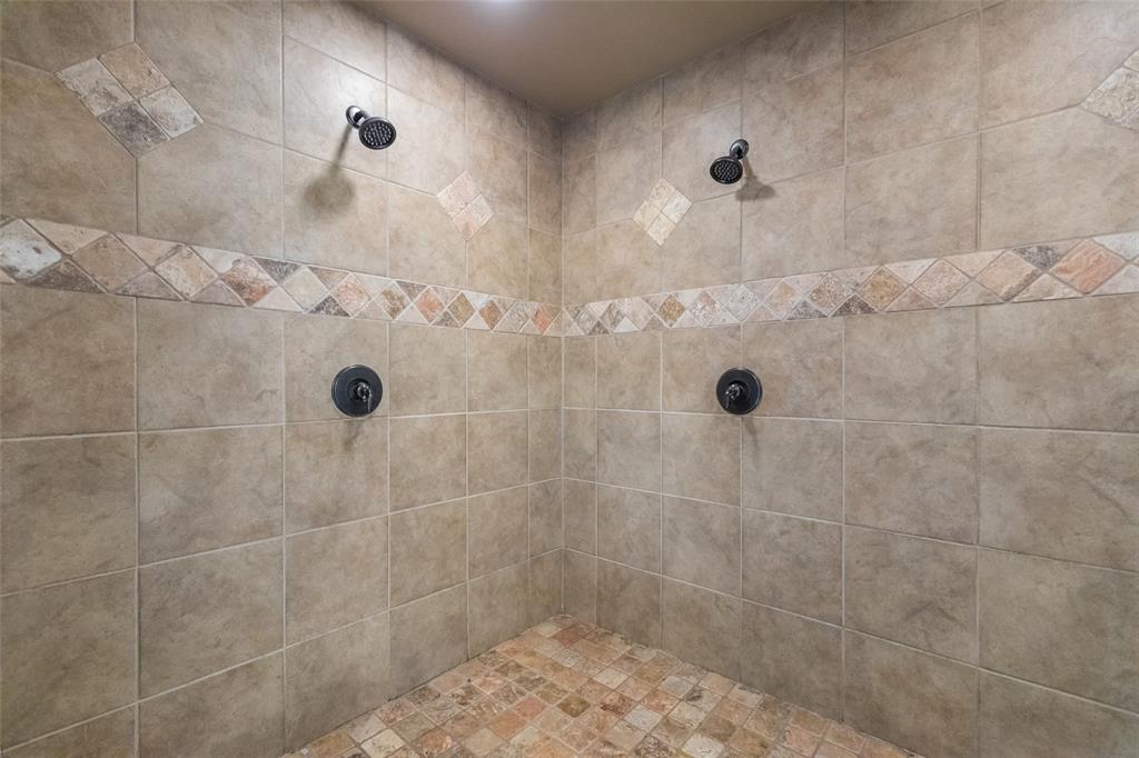 297 Magnum Street Tuscola, TX 79562 - Photo 23 of 35 a bathroom with a shower
