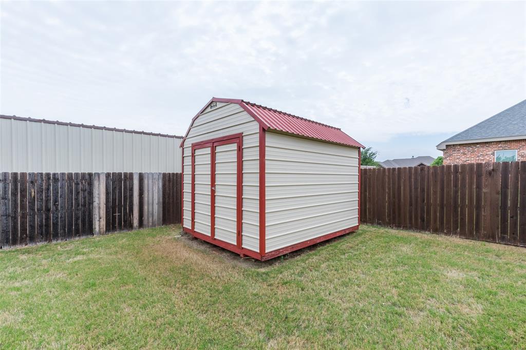 297 Magnum Street Tuscola, TX 79562 - Photo 35 of 35 a view of a backyard