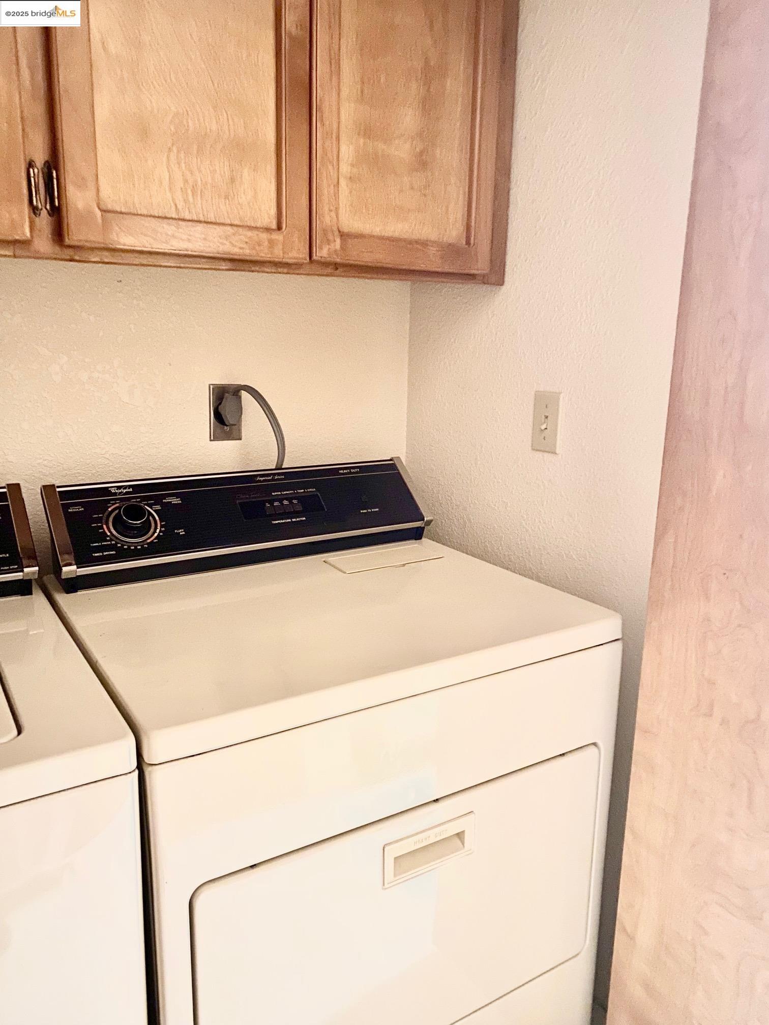13133 Mohrmann Street Groveland, CA 95321 - Photo 16 of 53 a utility room with dryer and washer