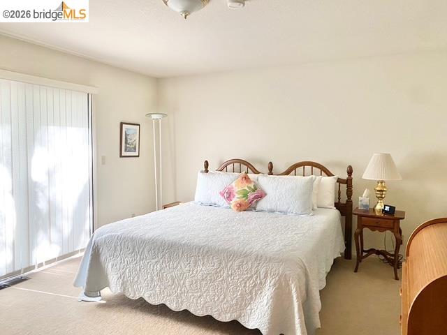 13133 Mohrmann Street Groveland, CA 95321 - Photo 17 of 55 a bedroom with a bed and a table