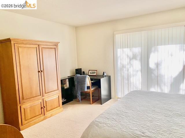 13133 Mohrmann Street Groveland, CA 95321 - Photo 18 of 55 a bedroom with a bed and a large window