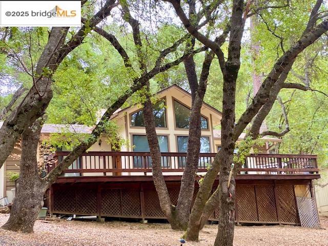 13133 Mohrmann Street Groveland, CA 95321 - Photo 2 of 53 a front view of house with outdoor space and trees around