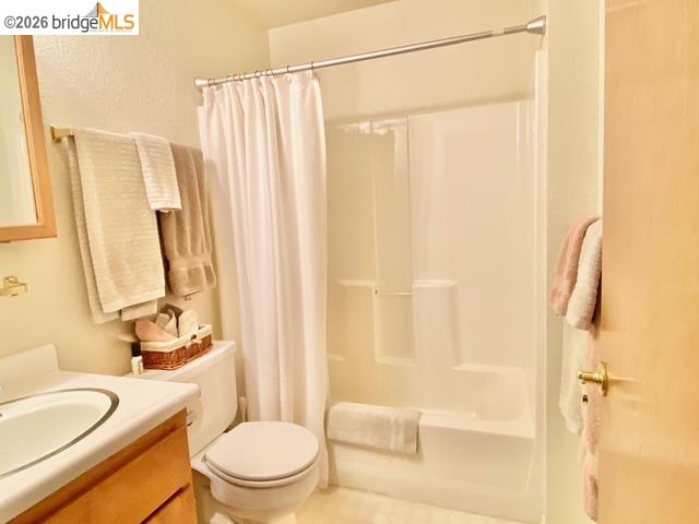 13133 Mohrmann Street Groveland, CA 95321 - Photo 23 of 55 a bathroom with a toilet a sink and a shower