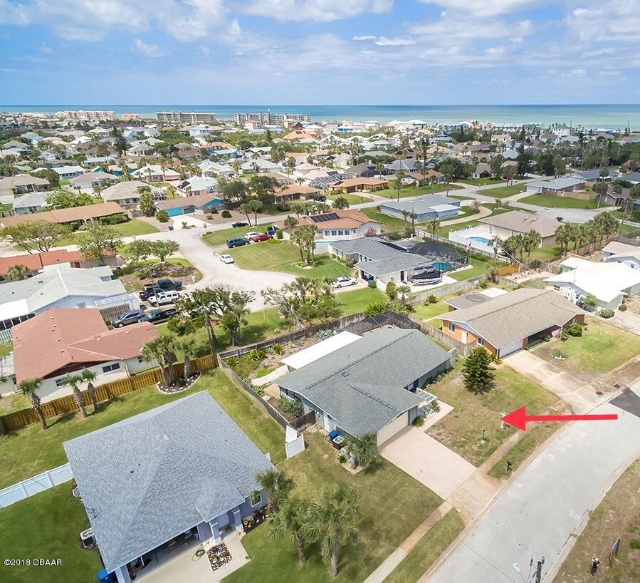 141 Beau Rivage Drive Ormond Beach, FL 32176 - Photo 30 of 34 an aerial view of residential houses with outdoor space