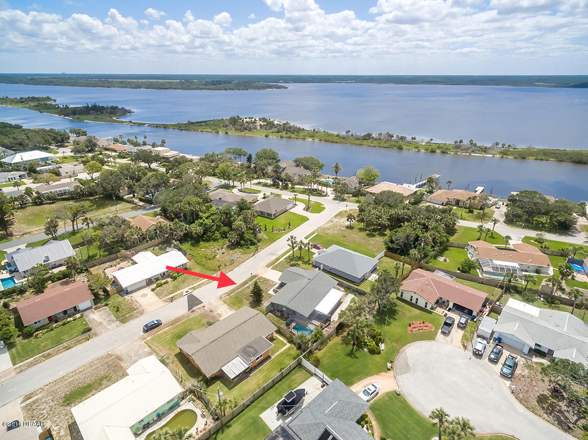 141 Beau Rivage Drive Ormond Beach, FL 32176 - Photo 31 of 34 an aerial view of a city