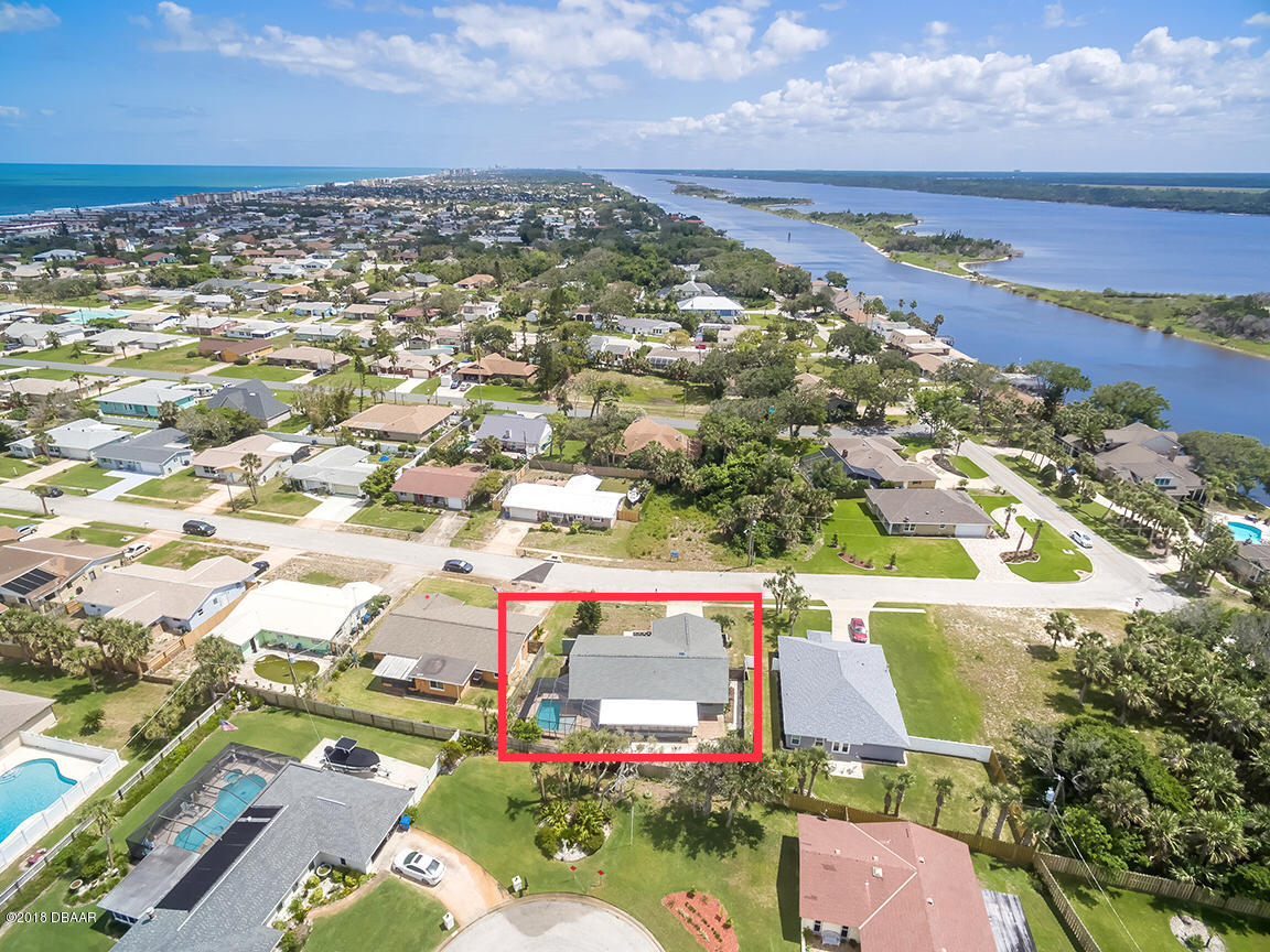 141 Beau Rivage Drive Ormond Beach, FL 32176 - Photo 34 of 34 an aerial view of a city