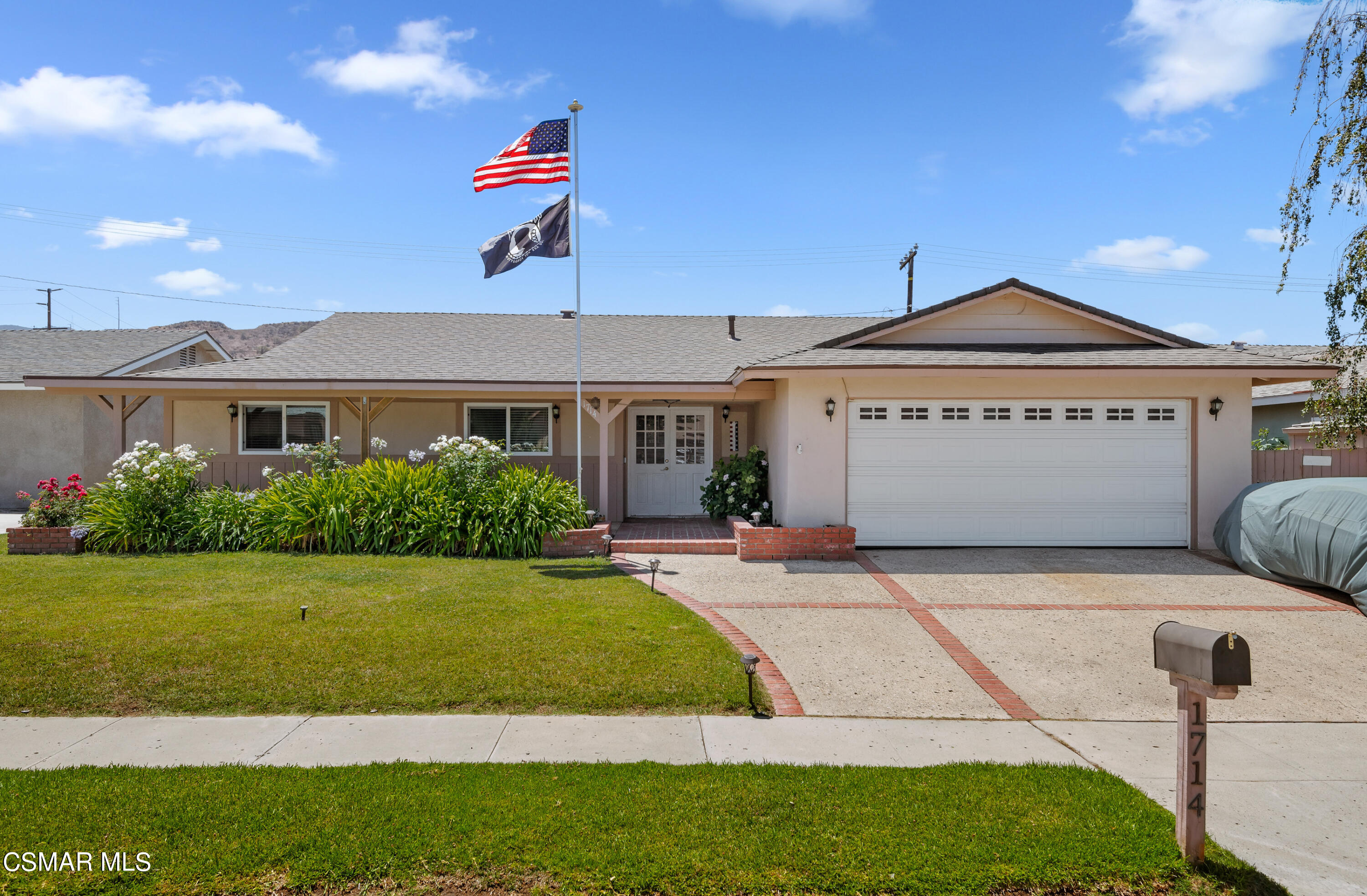1714 Fitzgerald Road Simi Valley, CA 93065 - Photo 1 of 23 a front view of a house with a yard