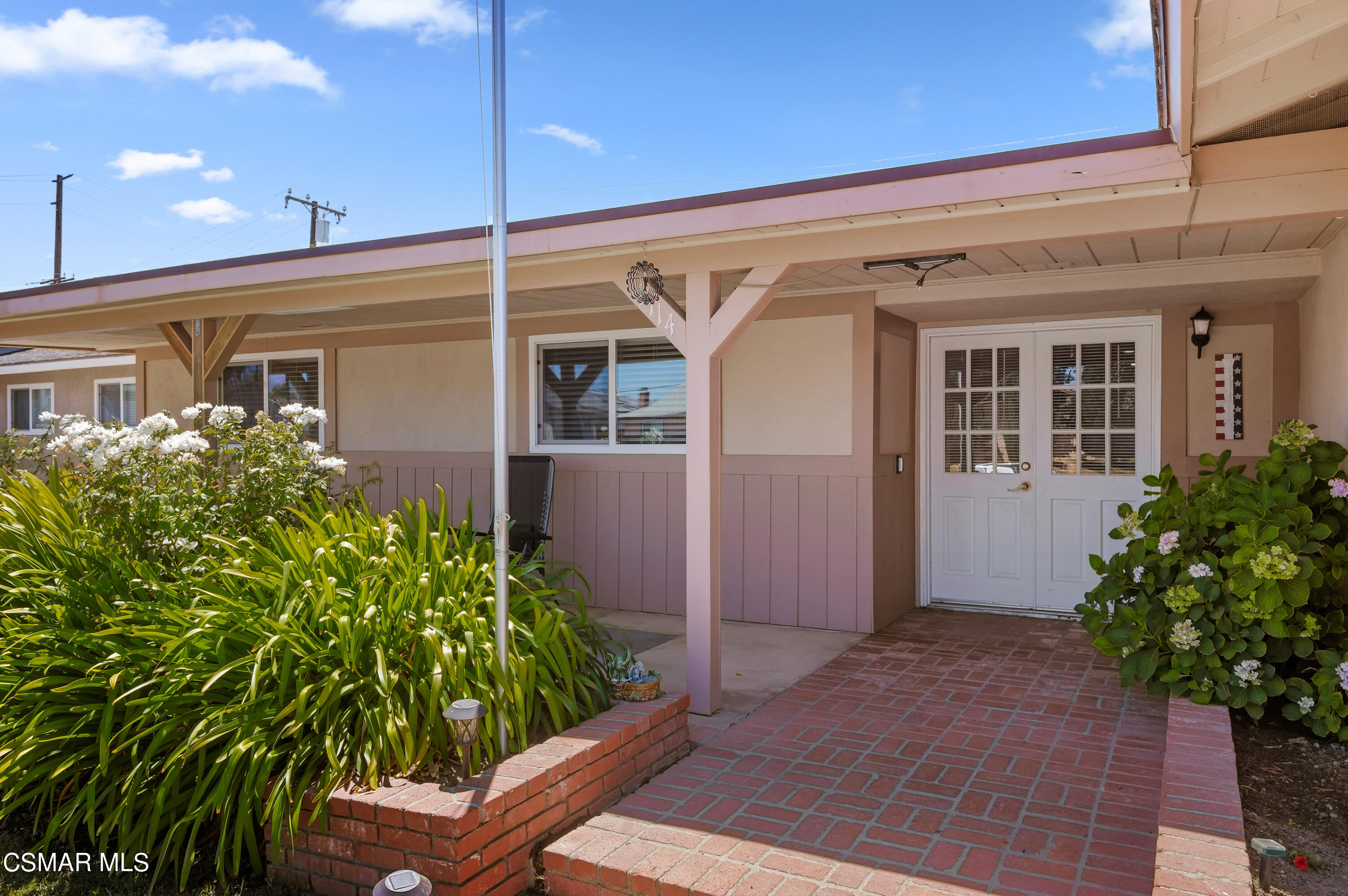 1714 Fitzgerald Road Simi Valley, CA 93065 - Photo 2 of 23 a view of a house with potted plants