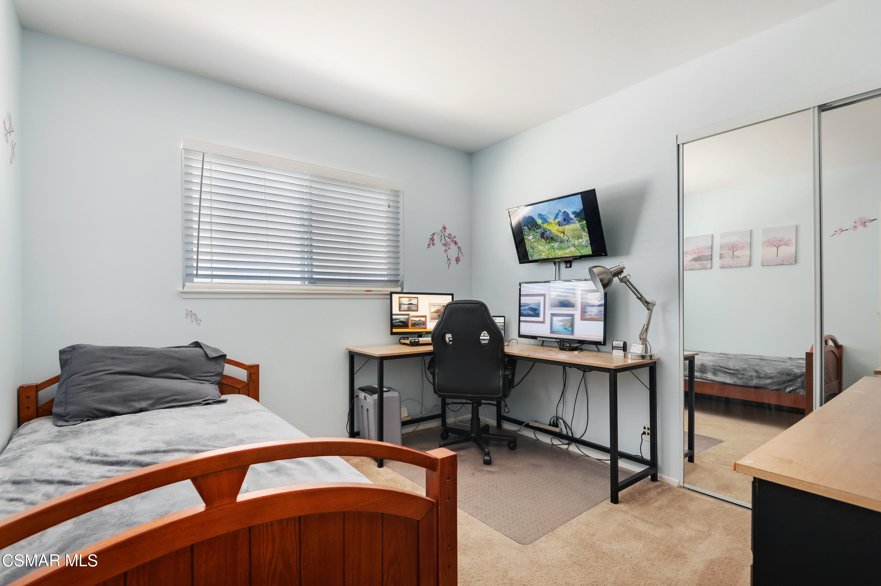 1714 Fitzgerald Road Simi Valley, CA 93065 - Photo 19 of 23 a bedroom with a bed and a desk