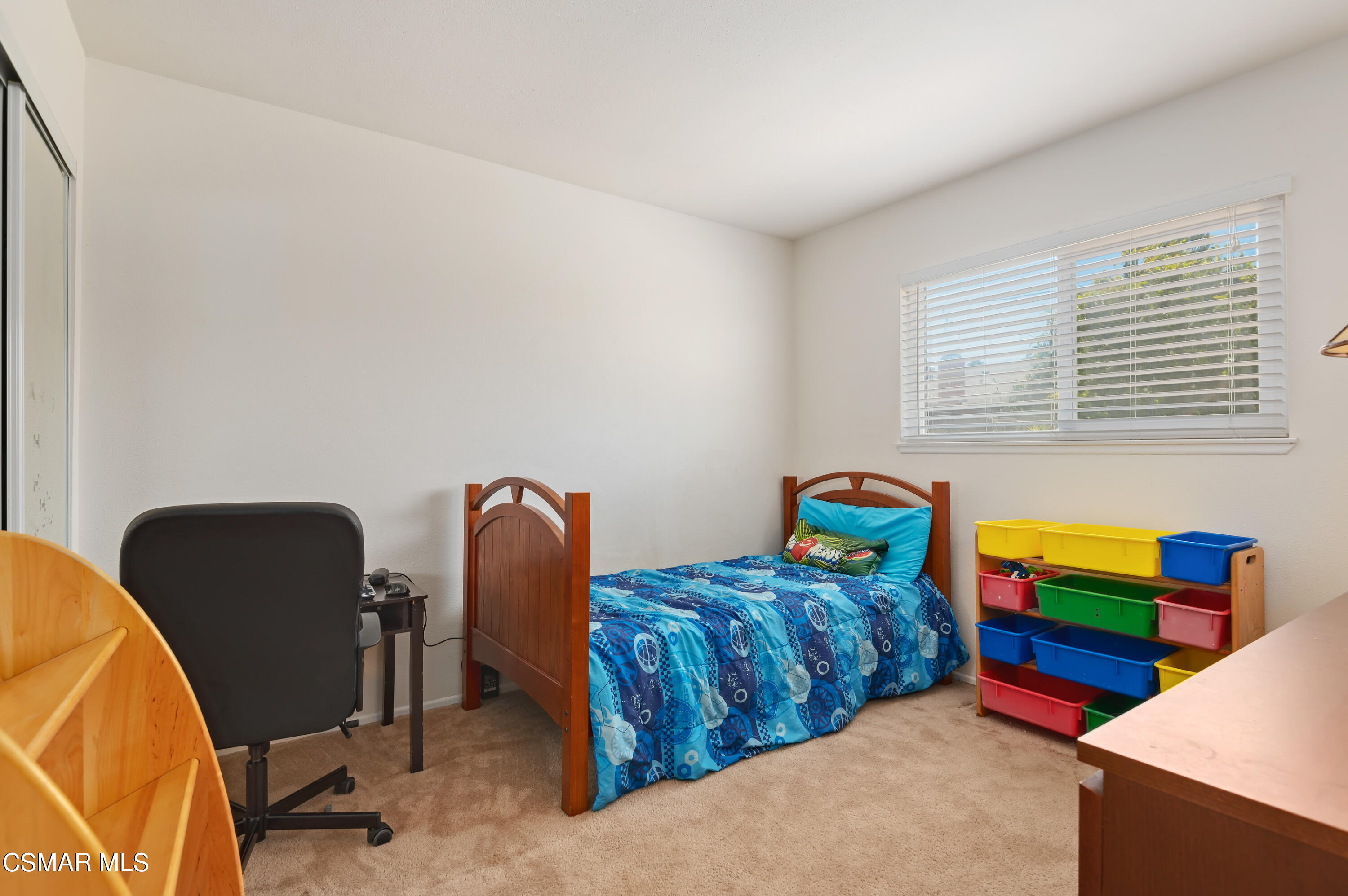 1714 Fitzgerald Road Simi Valley, CA 93065 - Photo 20 of 23 a bedroom with two beds and a chair