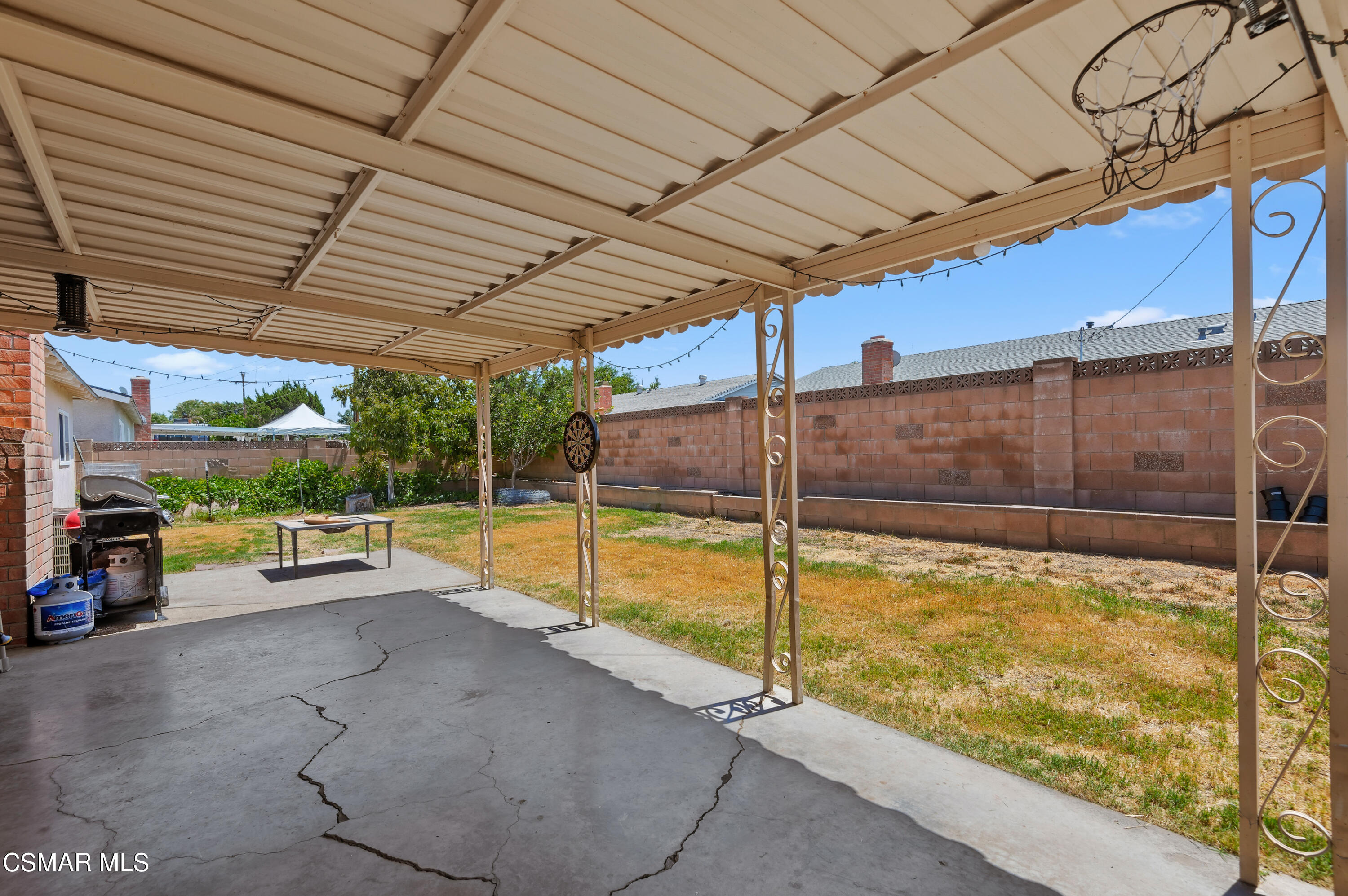 1714 Fitzgerald Road Simi Valley, CA 93065 - Photo 21 of 23 a view of a backyard with a large tree