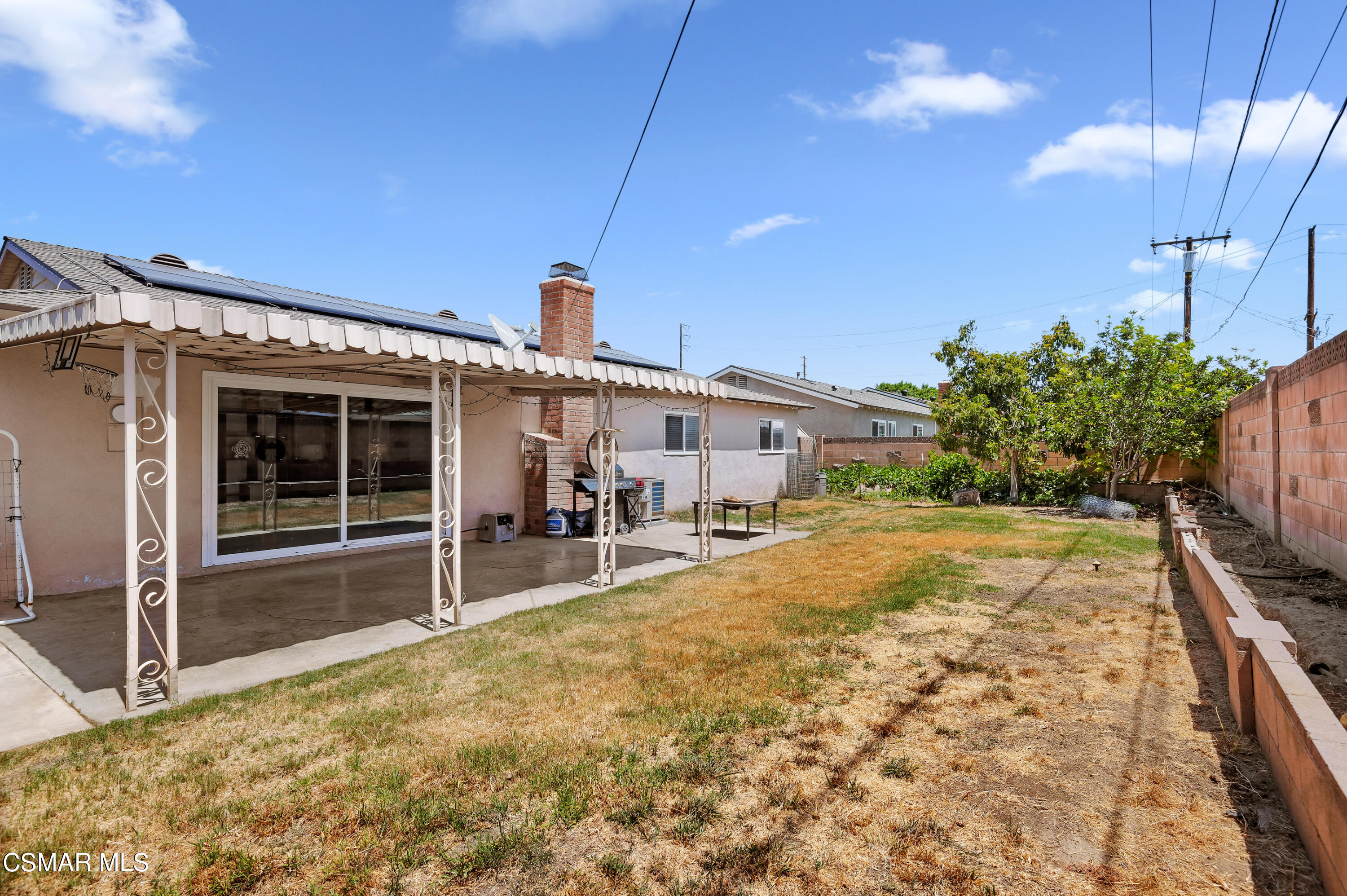 1714 Fitzgerald Road Simi Valley, CA 93065 - Photo 22 of 23 a view of a house with a backyard and sitting area