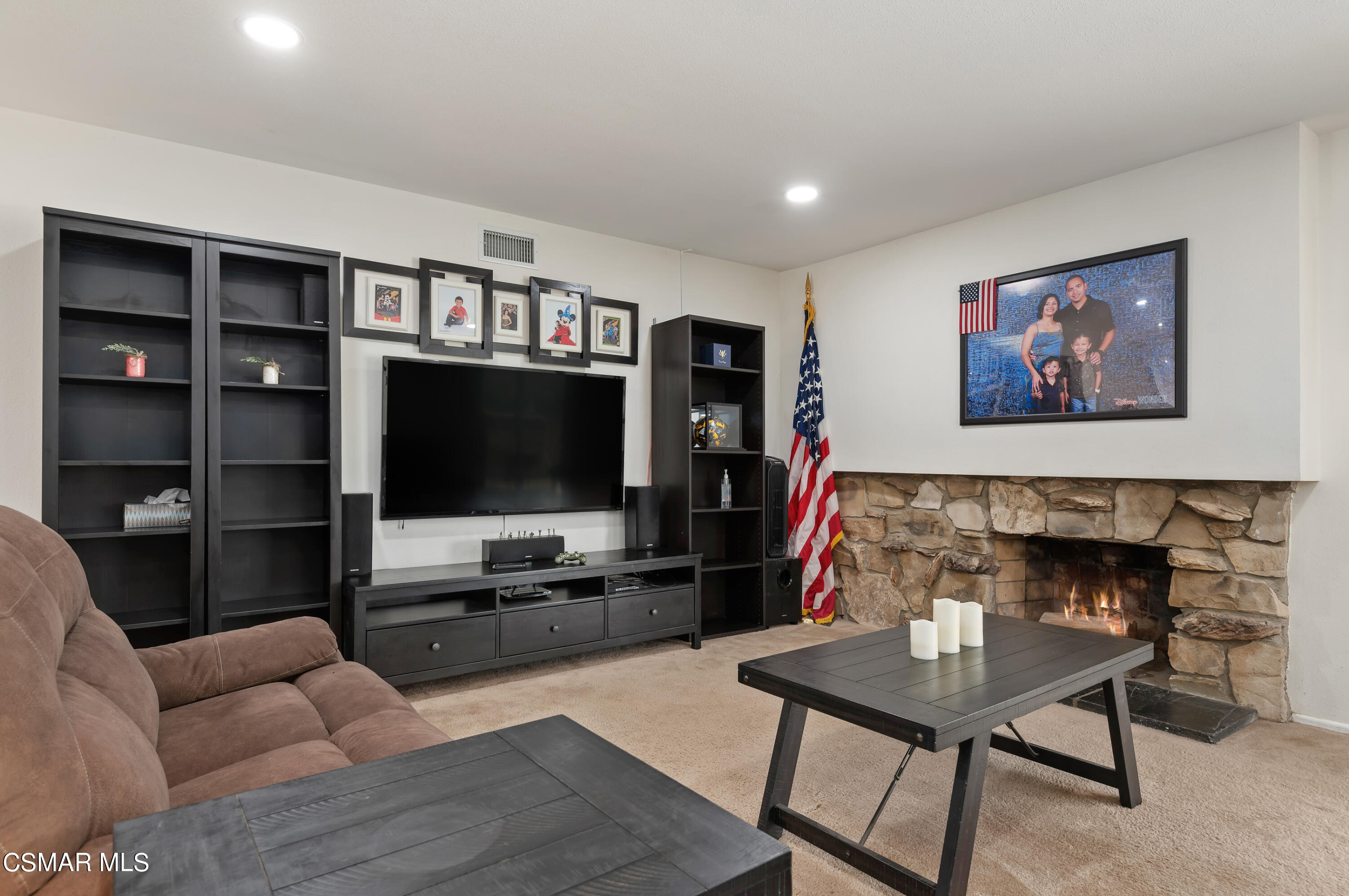 1714 Fitzgerald Road Simi Valley, CA 93065 - Photo 5 of 23 a living room with furniture and a flat screen tv