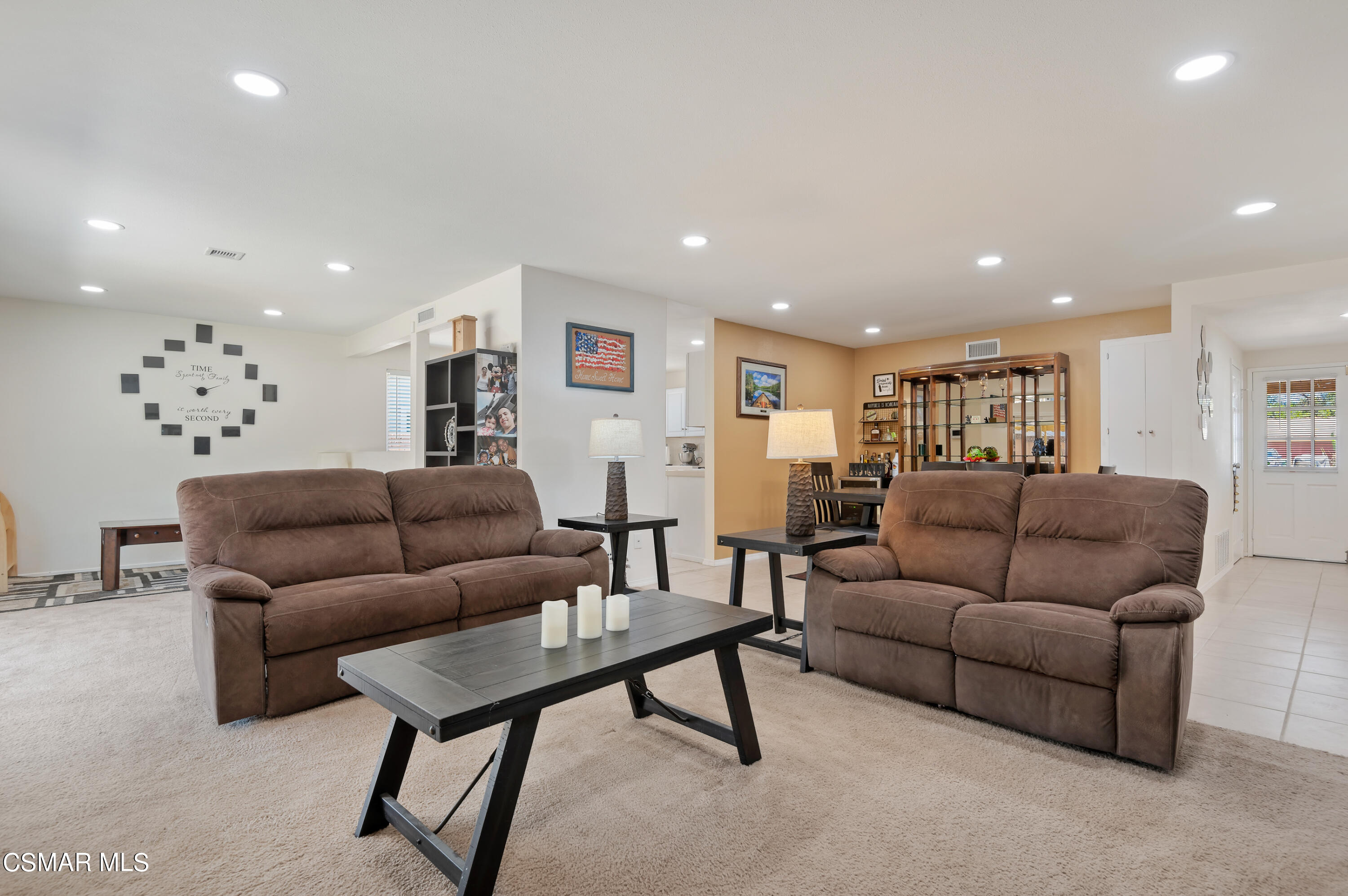 1714 Fitzgerald Road Simi Valley, CA 93065 - Photo 7 of 23 a living room with furniture and a potted plant